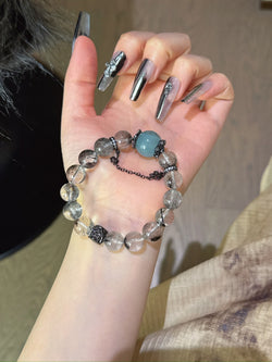 ▫️▪️ Black hair crystal aquamarine bracelet