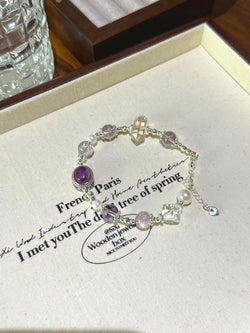 ▫️▪️ Amethyst and white crystal double-pointed bracelet