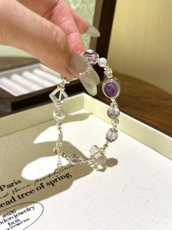 ▫️▪️ Amethyst and white crystal double-pointed bracelet