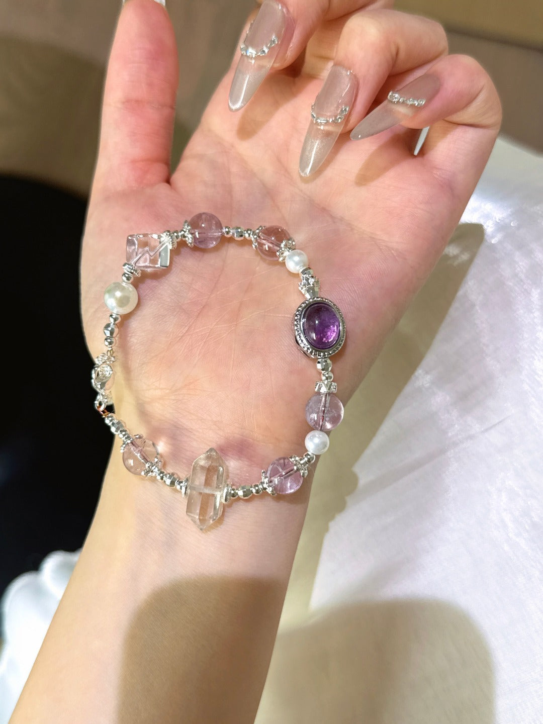 ▫️▪️ Amethyst and white crystal double-pointed bracelet