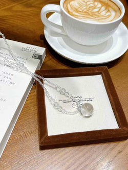 Natural white crystal ball necklace