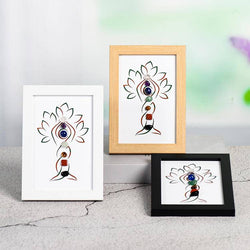 Seven chakras tree-like crystal stone picture frame on the table